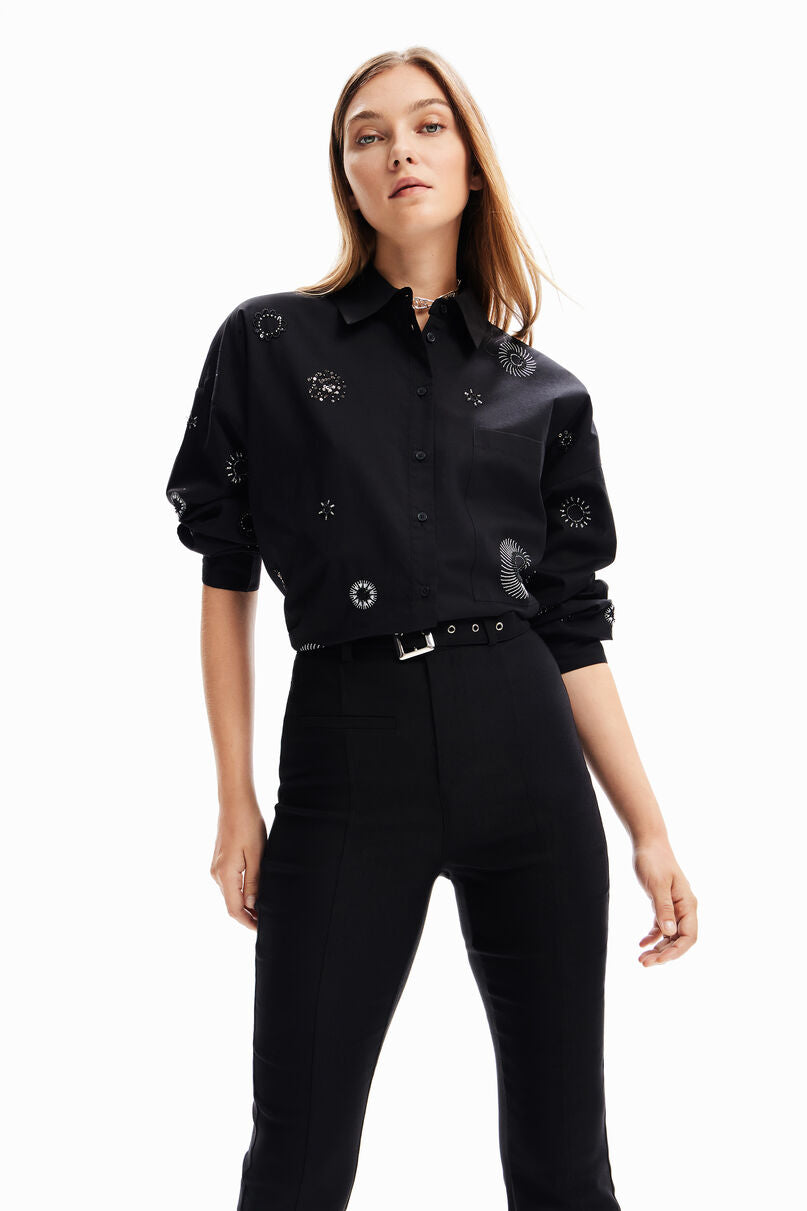 Belted flare trousers
